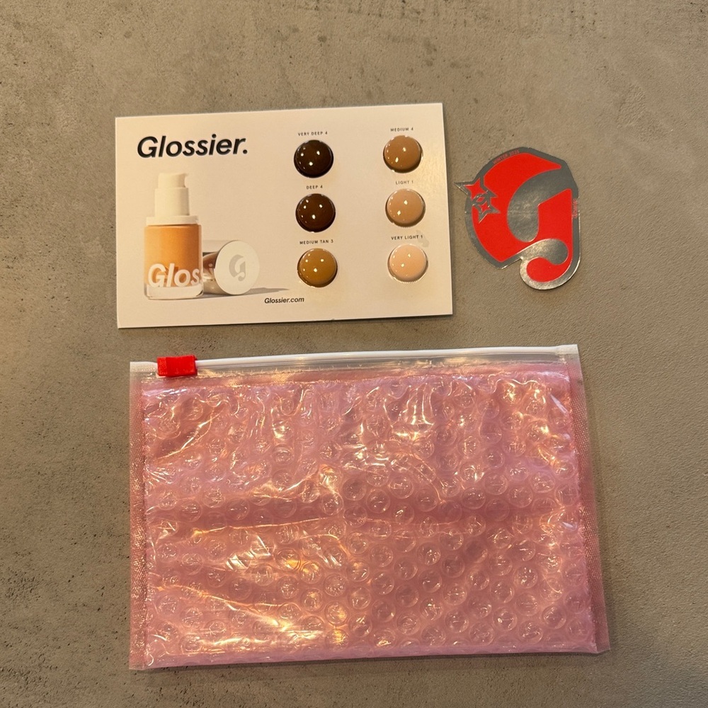 NWT GLOSSIER PINK POUCH STRETCH FOUNDATION SAMPLE WINTER 2025 STICKER
